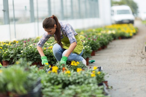 Gardener preparing tools and safety gear